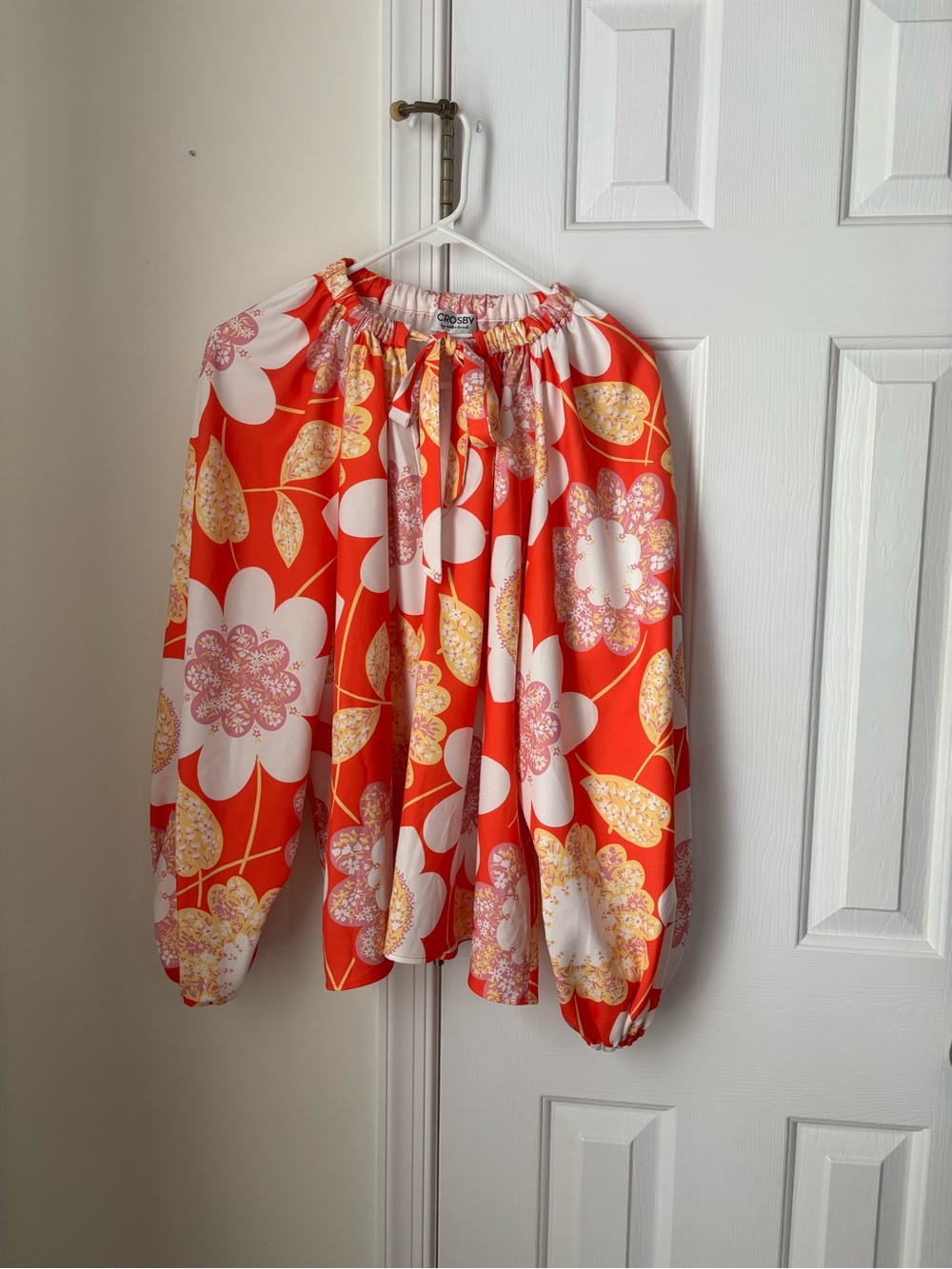 Orange floral blouse
